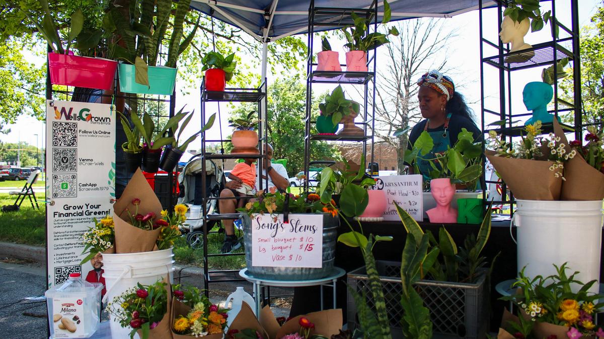 Charla Ford, 45, sets up plants at her booth at the Heritage Festival June 21, 2025.