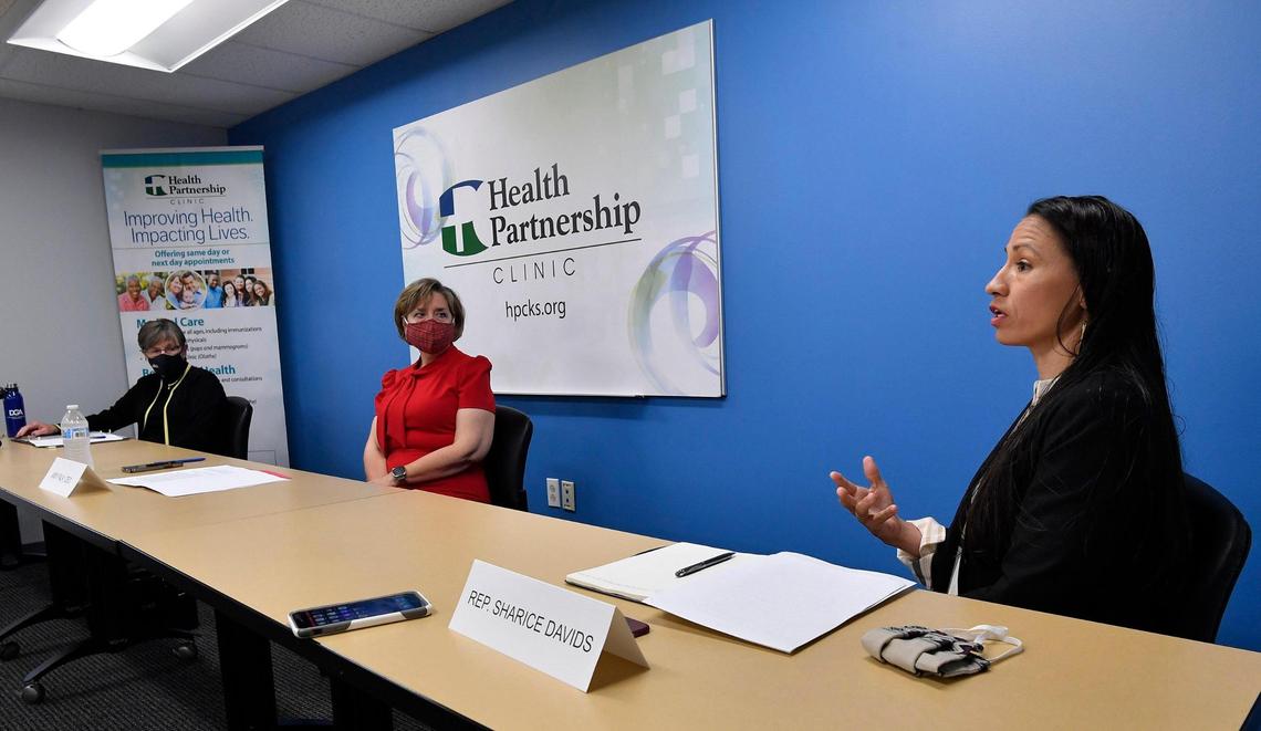 Kansas Gov. Laura Kelly, from left, Amy Falk, CEO of Health Partnership Clinic in Olathe, and U.S. Rep. Sharice Davids spoke at the clinic Wednesday, touting Medicaid expansion in Kansas.