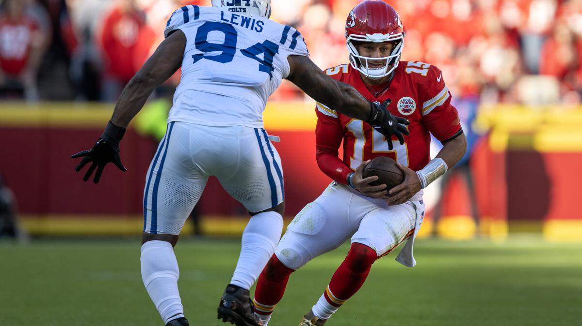Indianapolis Colts defensive end Tyquan Lewis (94) pressures Kansas City Chiefs quarterback Patrick Mahomes (15) in the second quarter on Sunday, Nov. 23, 2025 at GEHA Field at Arrowhead Stadium in Kansas City.