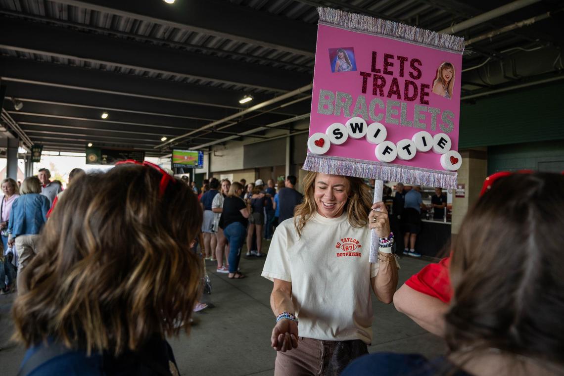 Taylor Swift fans exchanged friendship bracelets in the stands of Legends Field at the Kansas Swiftie Monarch game.