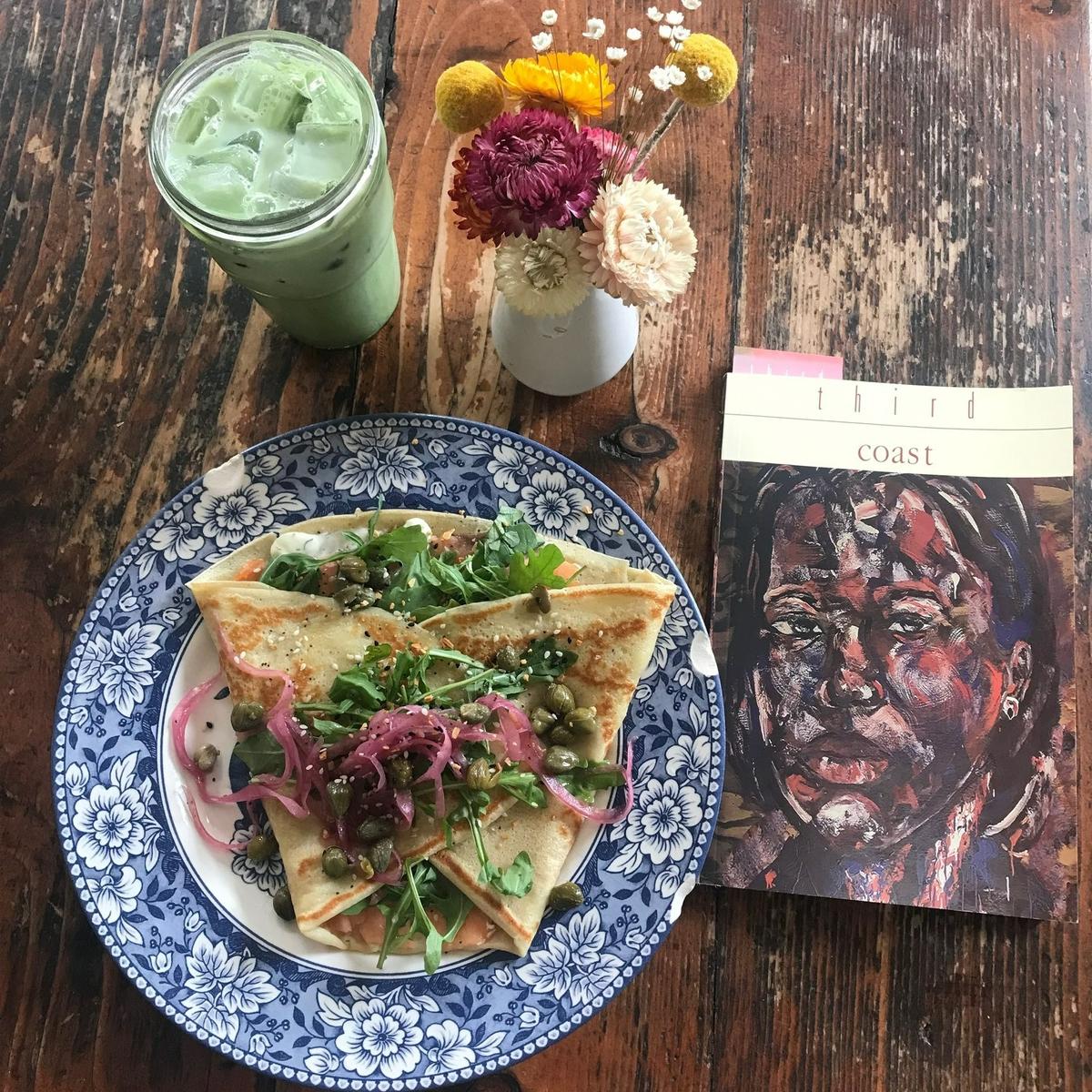 A matcha latte with honey-lavender syrup and a smoked salmon crepe are served at Seven Swans Creperie in the Westside neighborhood.