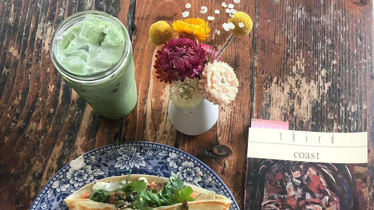 A matcha latte with honey-lavender syrup and a smoked salmon crepe are seen at Seven Swans Creperie in the Westside neighborhood of Kansas City in May.