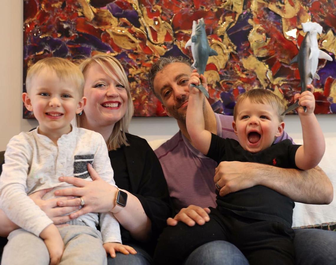 Jeni and Jake Box and their children Everett, left, and Kellen.