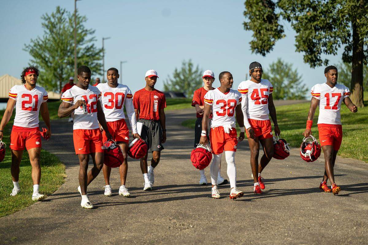 Players head to the field for practice during Chiefs training camp at Missouri Western State University on Friday in St. Joseph, Mo.