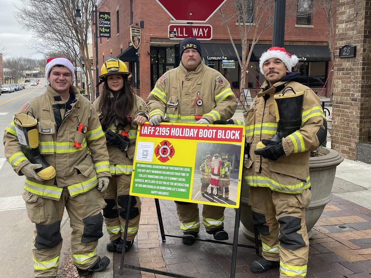 A team of four firefighters, often accompanied by Santa Claus, gather donations from all four corners of the four-way stop in downtown Lee’s Summit.
