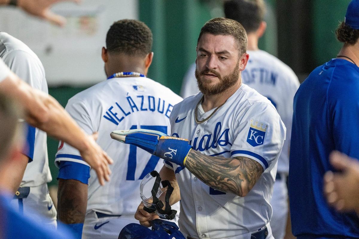 Kansas City Royals outfielder Kyle Isbel (28) is congratulated after scoring a run as the Royals took on the New York Yankees on Wednesday, June 12, 2024, at Kauffman Stadium.