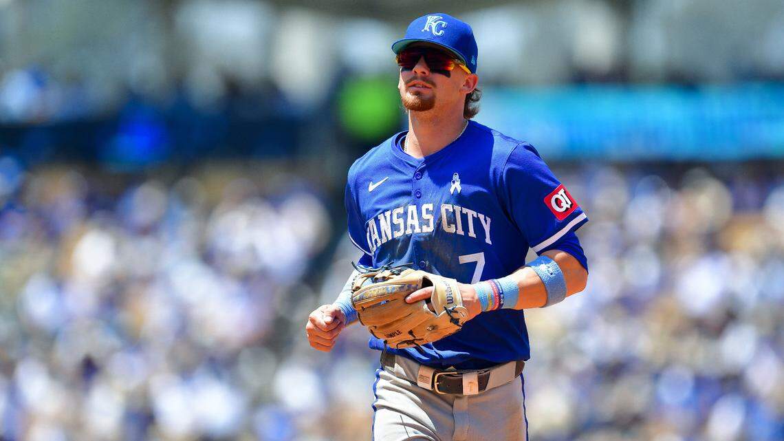 Kansas City Royals shortstop Bobby Witt Jr. (7) returns to the dugout following the fourth inning against the Los Angeles Dodgers at Dodger Stadium on June 16, 2024.