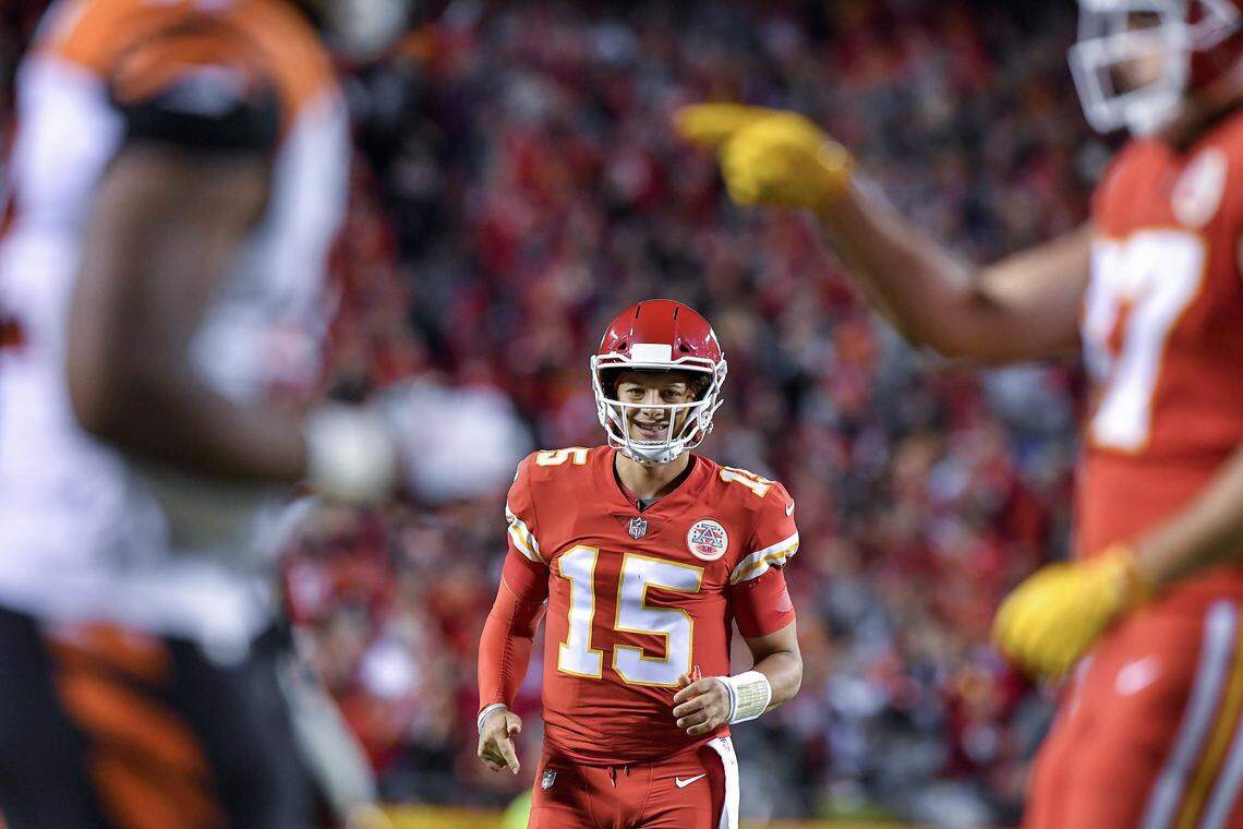Kansas City Chiefs quarterback Patrick Mahomes smiled after running back Kareem Hunt scored on a second quarter 6-yard pass reception thrown by Mahomes during the Chiefs’ game with the Cincinnati Bengals in Kansas City. It was Mahomes’ 19th touchdown pass of the 2018 regular season.