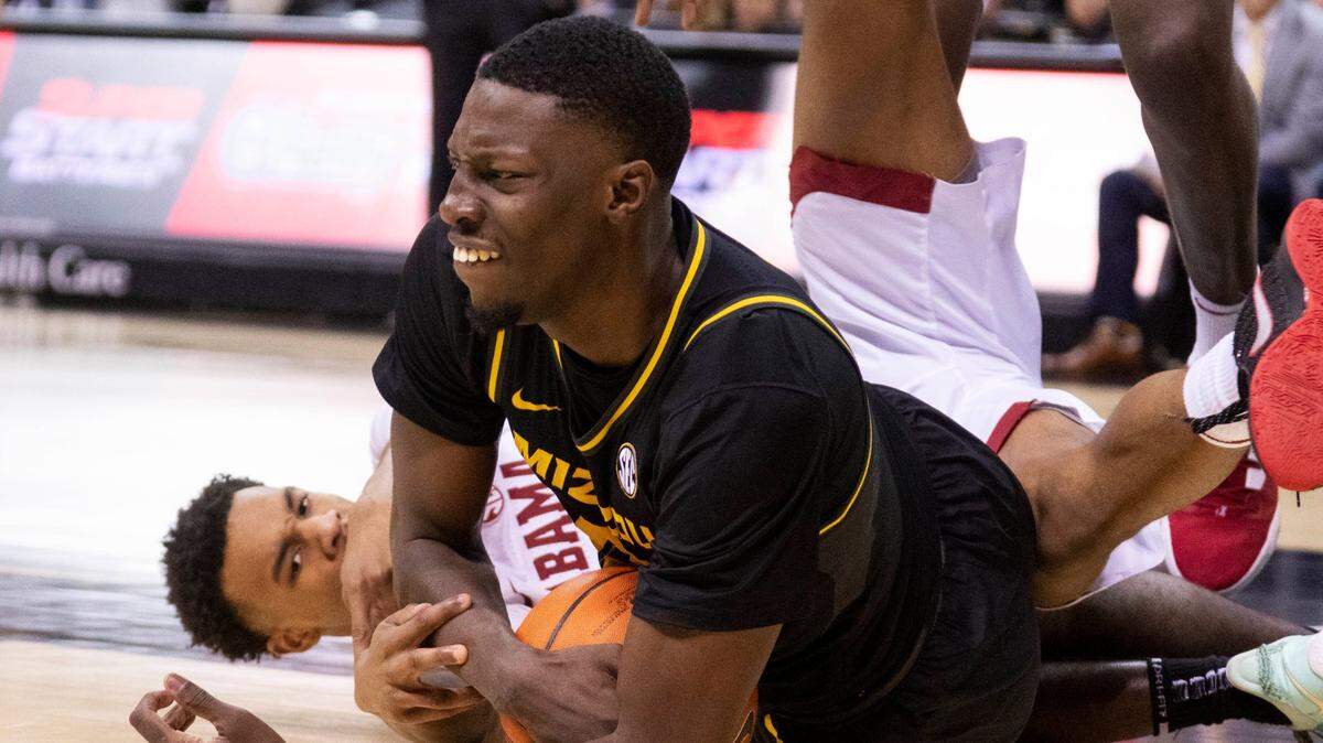 Missouri’s Mohamed Diarra pulls the ball from Alabama’s Rylan Griffen during the second half of a game Saturday, Jan. 21, 2023, in Columbia, Mo. Alabama won 85-64.