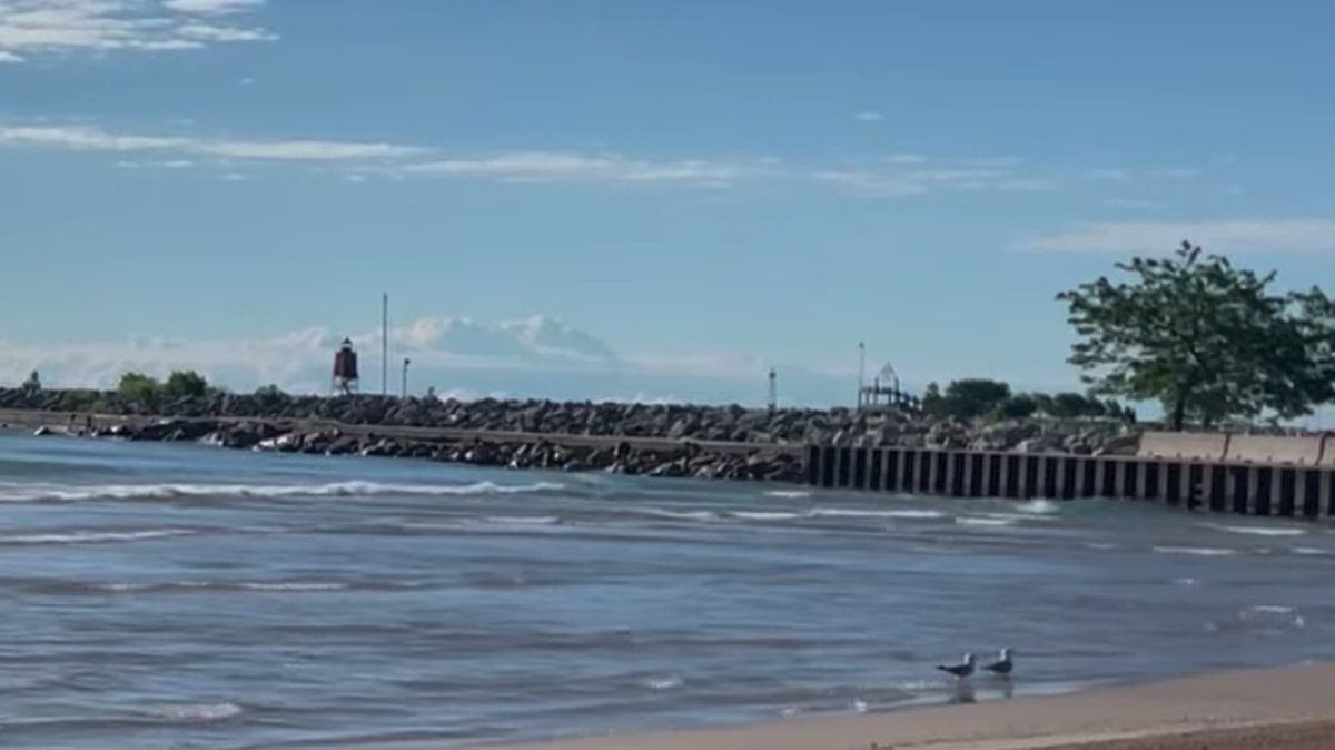 A man drowned in Lake Michigan along North Beach in Racine County, Wisconsin, as he rescued two small children.