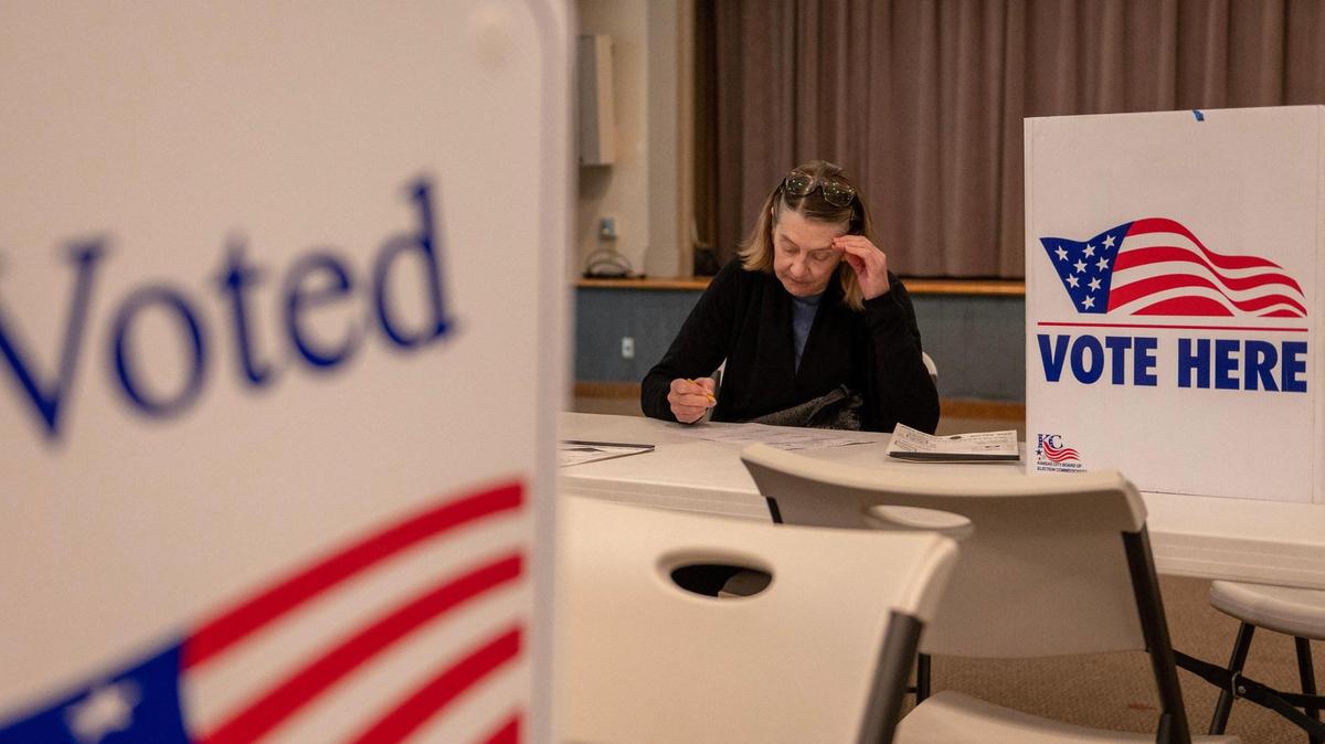 Beth Burnett casts a ballot at Country Club Christian Church on Tuesday, April 4, 2023, in Kansas City.