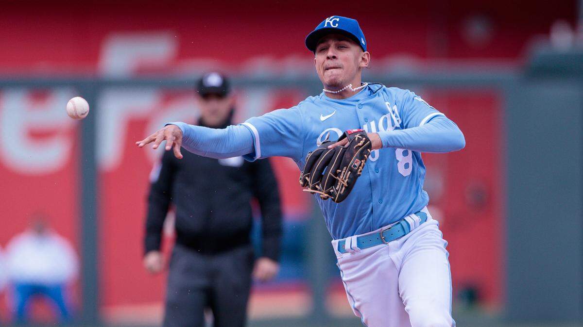 Apr 16, 2023; Kansas City, Missouri, USA; Kansas City Royals shortstop Nicky Lopez (8) throws to first base during the sixth inning against the Atlanta Braves at Kauffman Stadium. Mandatory Credit: William Purnell-USA TODAY Sports
