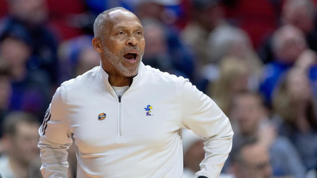Acting Kansas head coach Norm Roberts yells to his team during a second-round college basketball game against Arkansas in the NCAA Tournament Saturday, March 18, 2023, in Des Moines, Iowa.