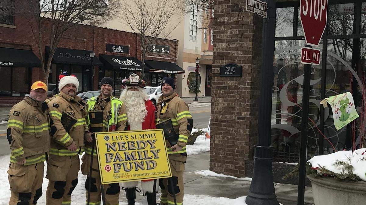 A team of firefighters, gather donations in downtown Lee’s Summit.