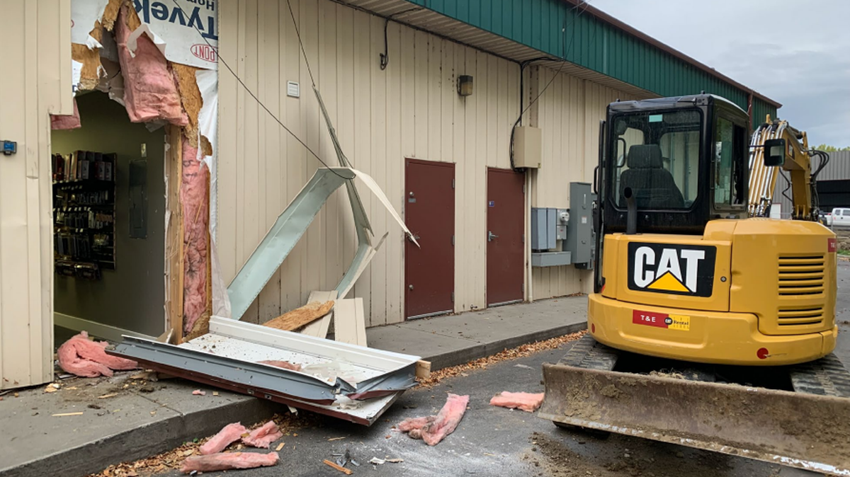 Montana gun store damaged after a man allegedly stole firearms by tearing a hole in the wall with an excavator from a nearby construction site, officials say.