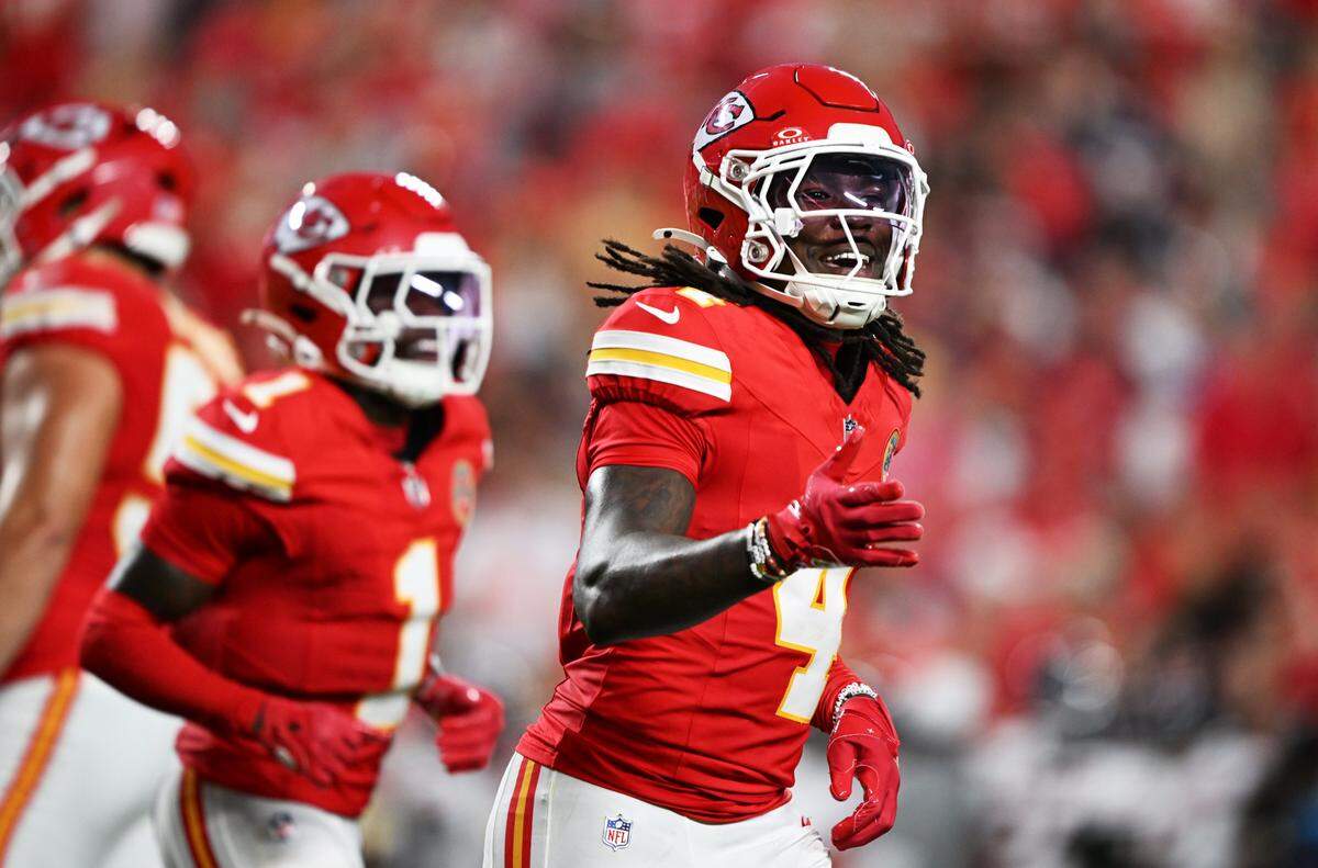 Kansas City Chiefs wide receiver Rashee Rice (4) celebrates after pulling in a pass for a touchdown in the first quarter against the Chicago Bears on Friday, Aug. 22, 2025, at GEHA Field at Arrowhead Stadium.