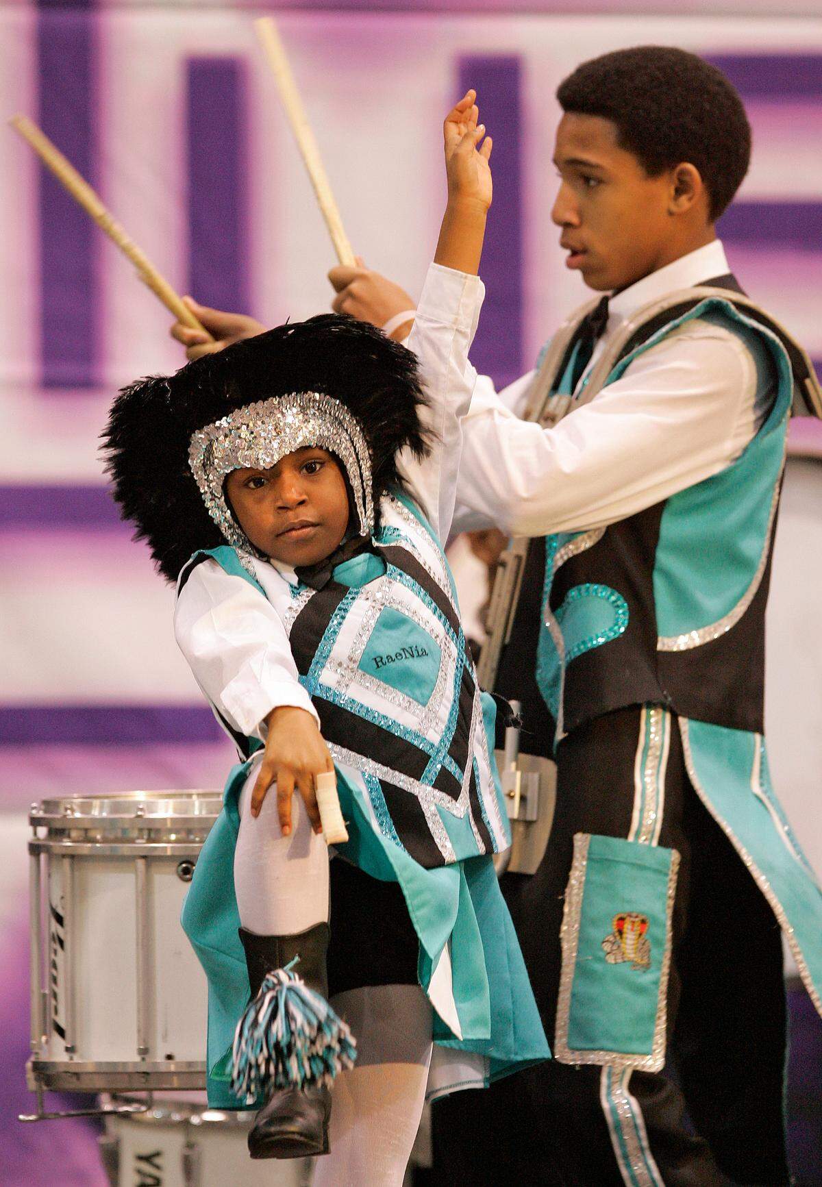 Members of the Marching Cobras perform at the Missouri Black Expo at Bartle Hall in 2005.