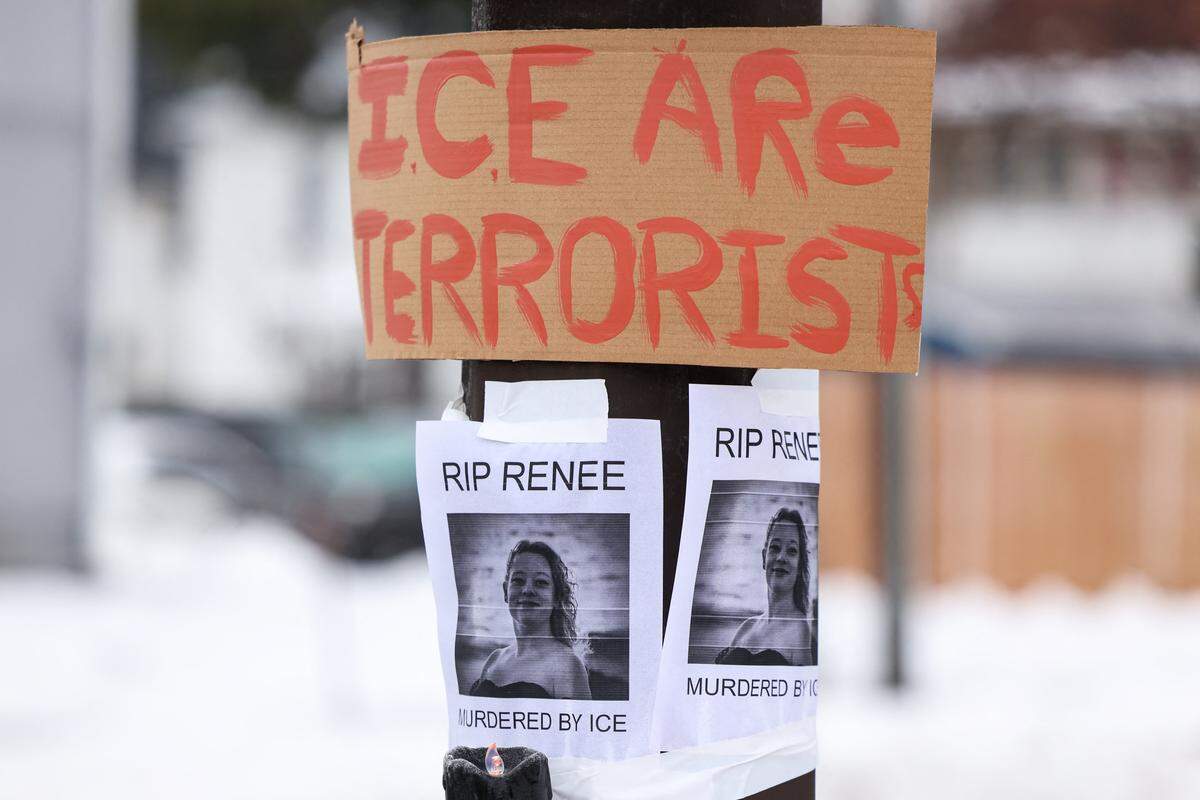 A picture of Renee Nicole Good is displayed near a makeshift memorial for Good, who was shot and killed at point blank range on Jan. 7 by a US Immigration and Customs Enforcement (ICE) agent as she apparently tried to drive away from agents who were crowding around her car, in Minneapolis, Minnesota, on Jan. 8, 2026. Good lived in Kansas City as recently as 2023, according to court records.