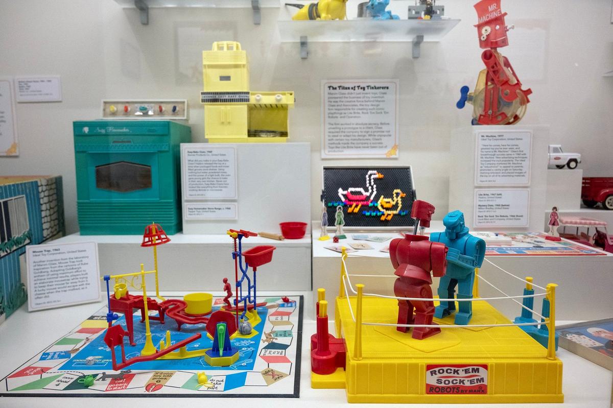 Mouse Trap, left, and Rock ‘Em Sock ‘Em Robots fuel the nostalgia at the National Museum of Toys and Miniatures.