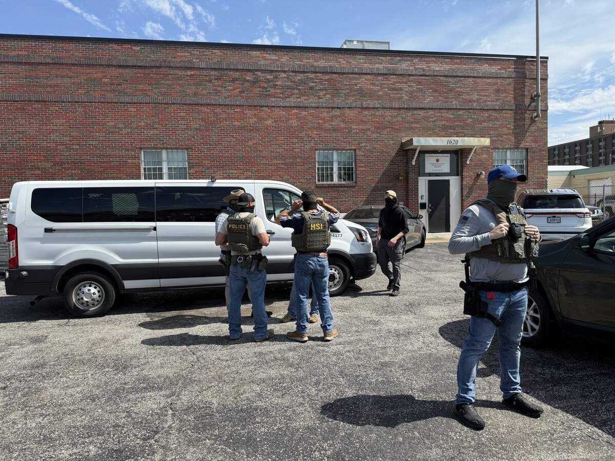 Agents from Homeland Security Investigations, which is a unit of U.S. Immigration and Customs Enforcement, at Fontanella Foods in Northeast Kansas City on July 9 at 11 a.m.