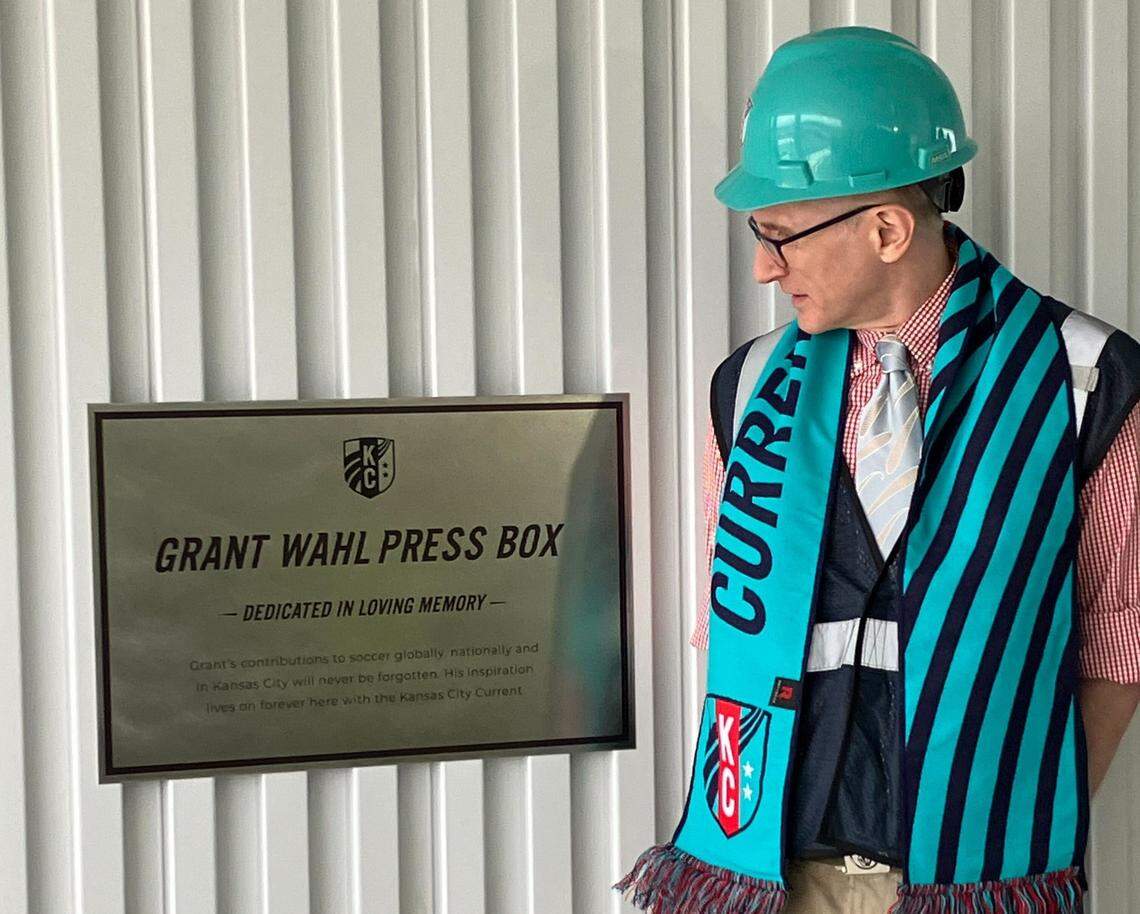 Eric Wahl, brother of the late soccer writer Grant Wahl, checks out a plaque at the KC Current’s new stadium proclaiming the venue’s press box the “Grant Wahl Press Box.”