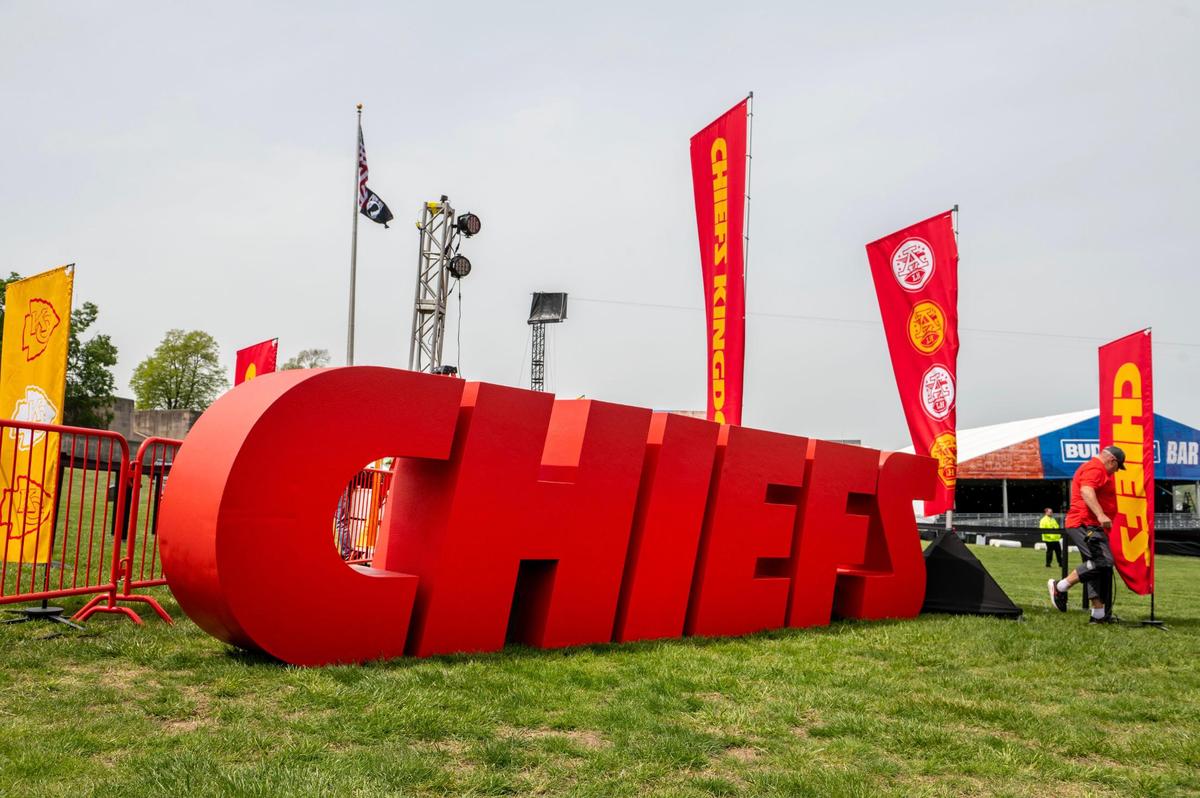 A giant Kansas City Chiefs sign is displayed at the Chiefs Kingdom Experience Wednesday at the NFL Draft preview.