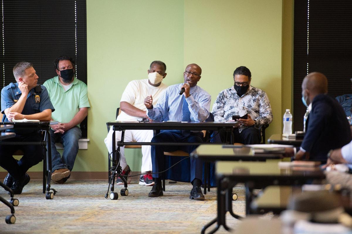 Henry C Service, middle, speaks up about his concerns as a business owner in the 18th and Vine District Friday morning, June 26, 2020. Kansas City mayor, city council members, police officers and business owners gathered at Black Archives of Mid-America Friday to discuss the crime issues around the 18th and Vine District.