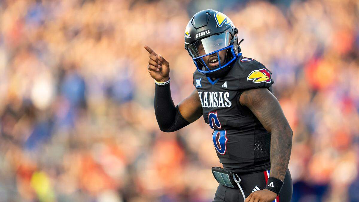 Kansas Jayhawks quarterback Jalon Daniels (6) celebrates after a touchdown against the Illinois Fighting Illini during the first half at David Booth Kansas Memorial Stadium on Sept. 8, 2023.