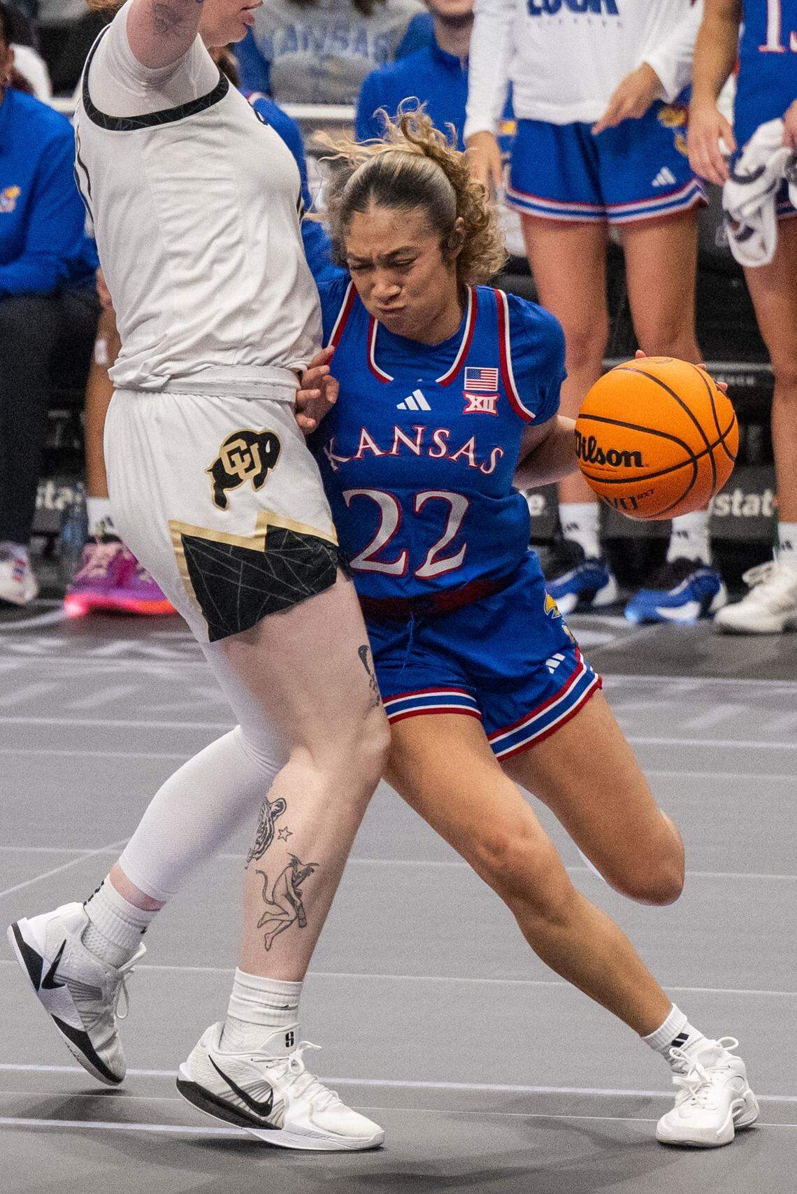 Kansas Jayhawks guard Sania Copeland (22) drives the ball looking to pass in the second half of the Jayhawks first round game of the Big 12 Women's Basketball Tournament on Thursday, March 5, 2026, at T-Mobile Center.
