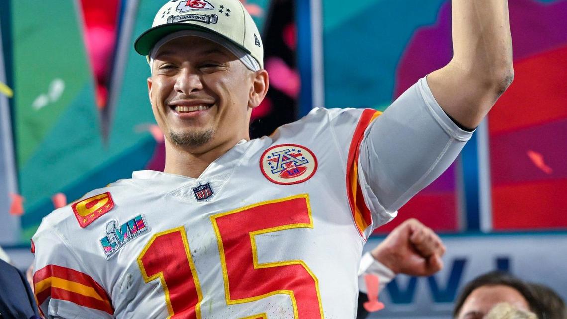 Kansas City Chiefs quarterback Patrick Mahomes (15) hoists the Lombardi Trophy after leading the Chiefs to a Super Bowl LVII victory, 38-35, over the Philadelphia Eagles on Sunday, Feb. 12, 2023, at State Farm Stadium in Glendale, Arizona.