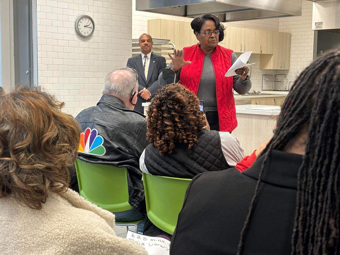 Sen. David Haley, background, watches as Rep. Valdenia Winn urges opposition to a GOP-led tax plan. Haley has said he is undecided on overriding Gov. Laura Kelly’s veto of the plan.