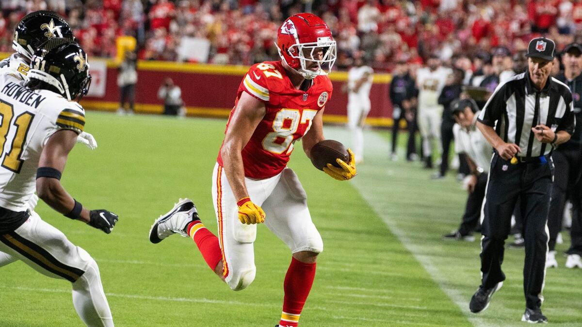 Kansas City Chiefs tight end Travis Kelce runs for yardage in the first half against the New Orleans Saints on Monday, Oct. 7, 2024, at GEHA Field at Arrowhead Stadium.