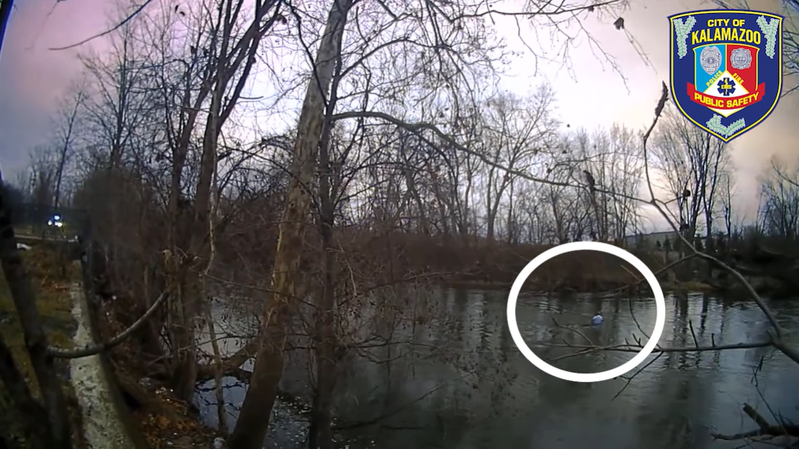 Footage shared by police shows a motorcyclist running into the Kalamazoo River while fleeing officers.
