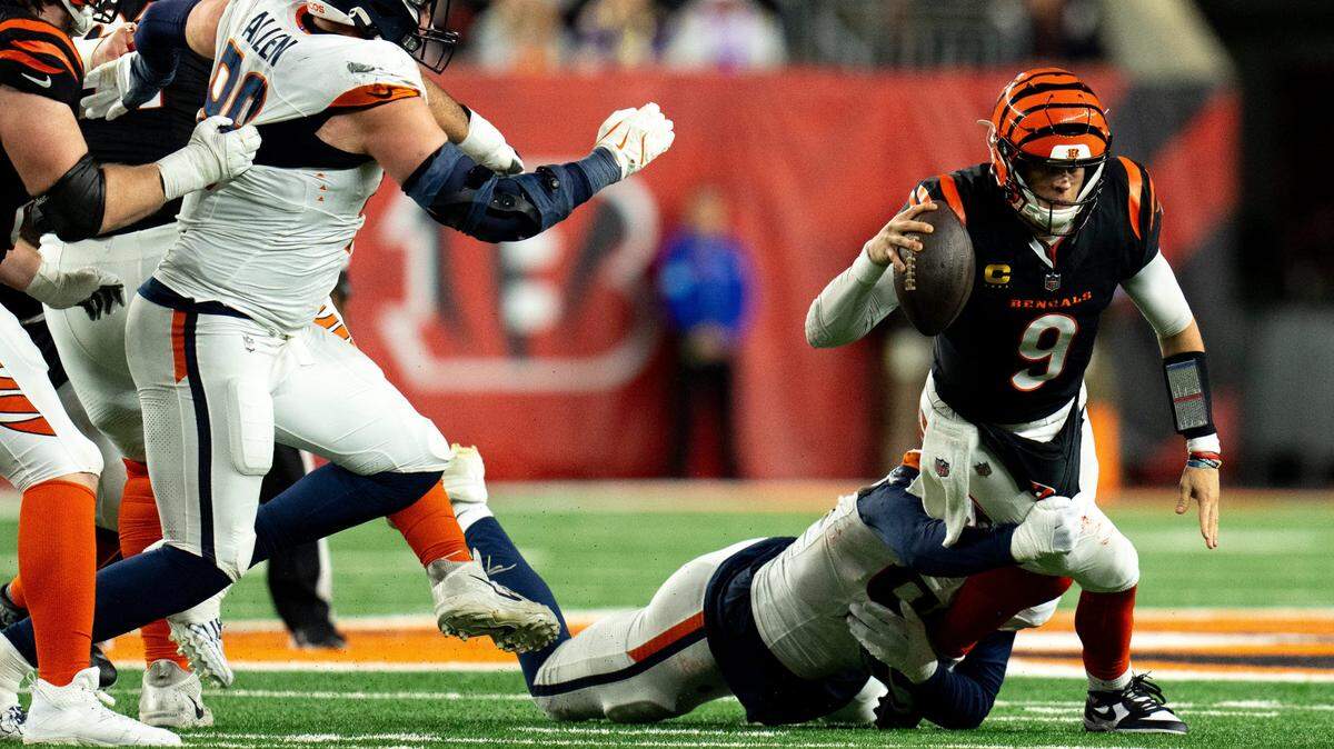 Denver Broncos outside linebacker Dondrea Tillman (92) sacks Cincinnati Bengals quarterback Joe Burrow (9) in the fourth quarter of the NFL game at Paycor Stadium in Cincinnati on Saturday, Dec. 28, 2024.