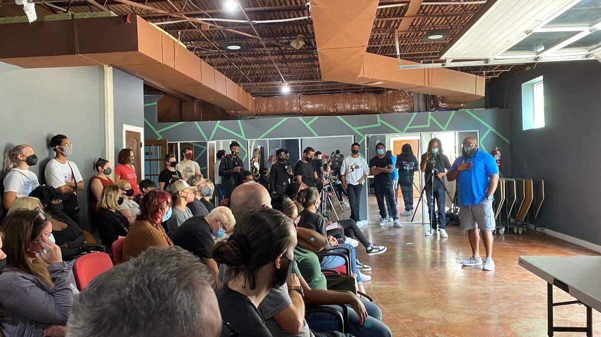 Murray Woodard speaks at a community town hall at Equal Minded Cafe on Saturday. The event was attended by community activists, parents and students to address racist incidents that have taken place at area schools this year.
