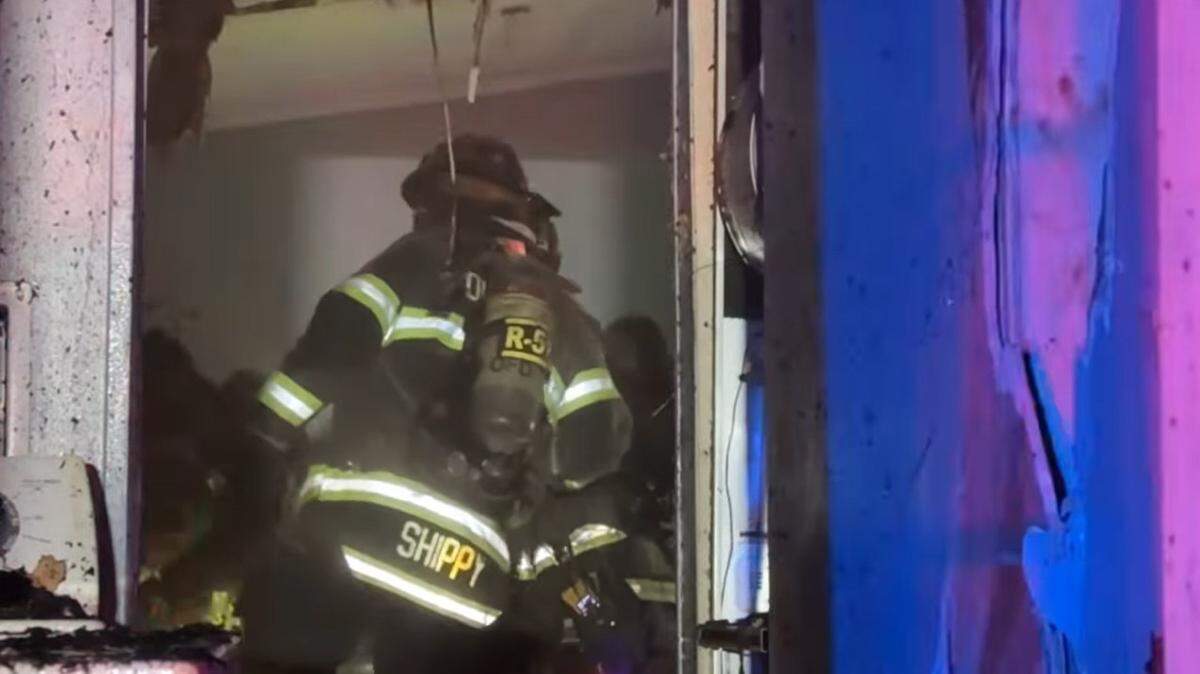 Firefighters from the Olathe and Lenexa fire departments responded to a house fire near near Santa Barbara Boulevard and Pasadena Drive Wednesday morning. Neighbors said they saw a lightning crack, then flames on the roof.