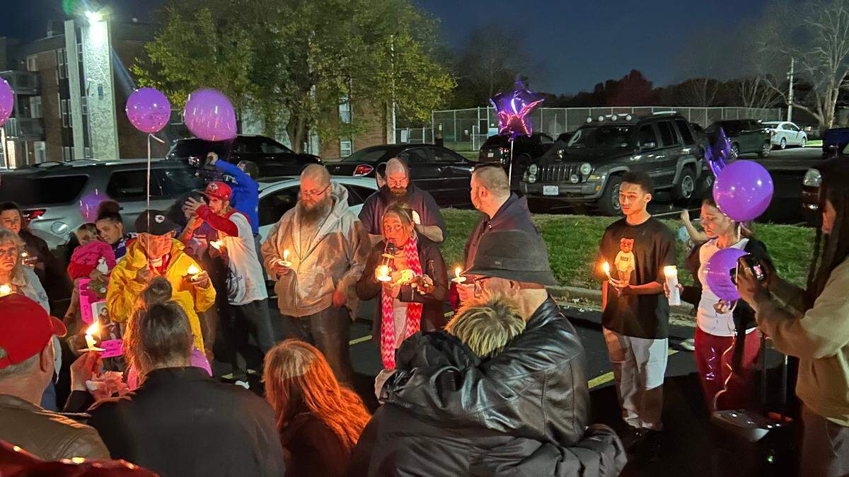 Residents gathered at the Oval Spring Apartment on Nov. 15 for a candelight vigil in honor of Maria Pike, 34, and Destinii Hope, 2 months. The mother and daughter were killed in their apartment in a police-involved shooting on Nov. 7.