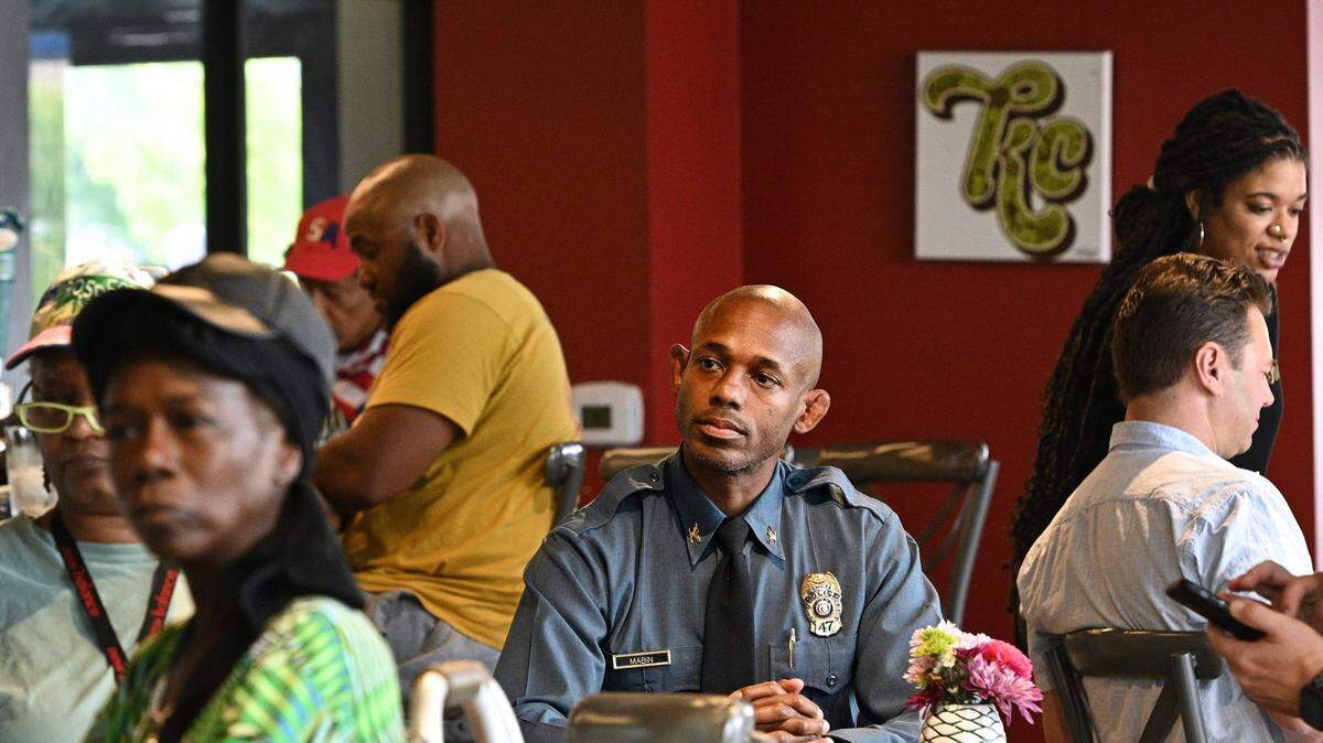 Joe Mabin, Kansas City Police Department interim police chief, listens to a speaker during a monthly mixer put on by Councilman Brandon Ellington at Soiree Steak & Oyster House in the 18th and Vine Jazz District Friday, July 1, 2022.