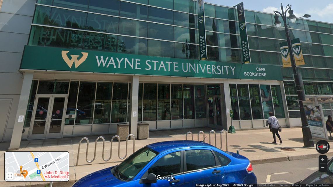 A professor at Wayne State University has been suspended over what the campus president calls a social media post justifying murder.