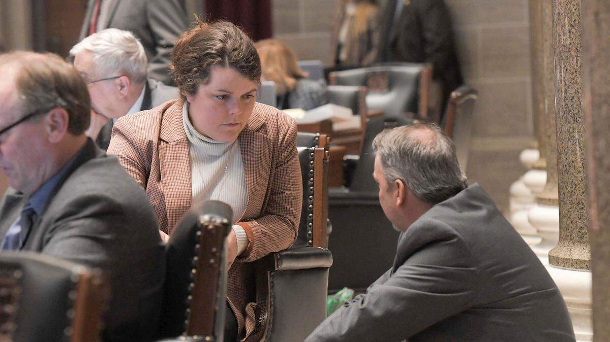 Missouri Rep. Hannah Kelley, a Mountain Grove Republican, speaks with Rep. Jamie Gragg, an Ozark Republican, on the House floor on March 7, 2024.