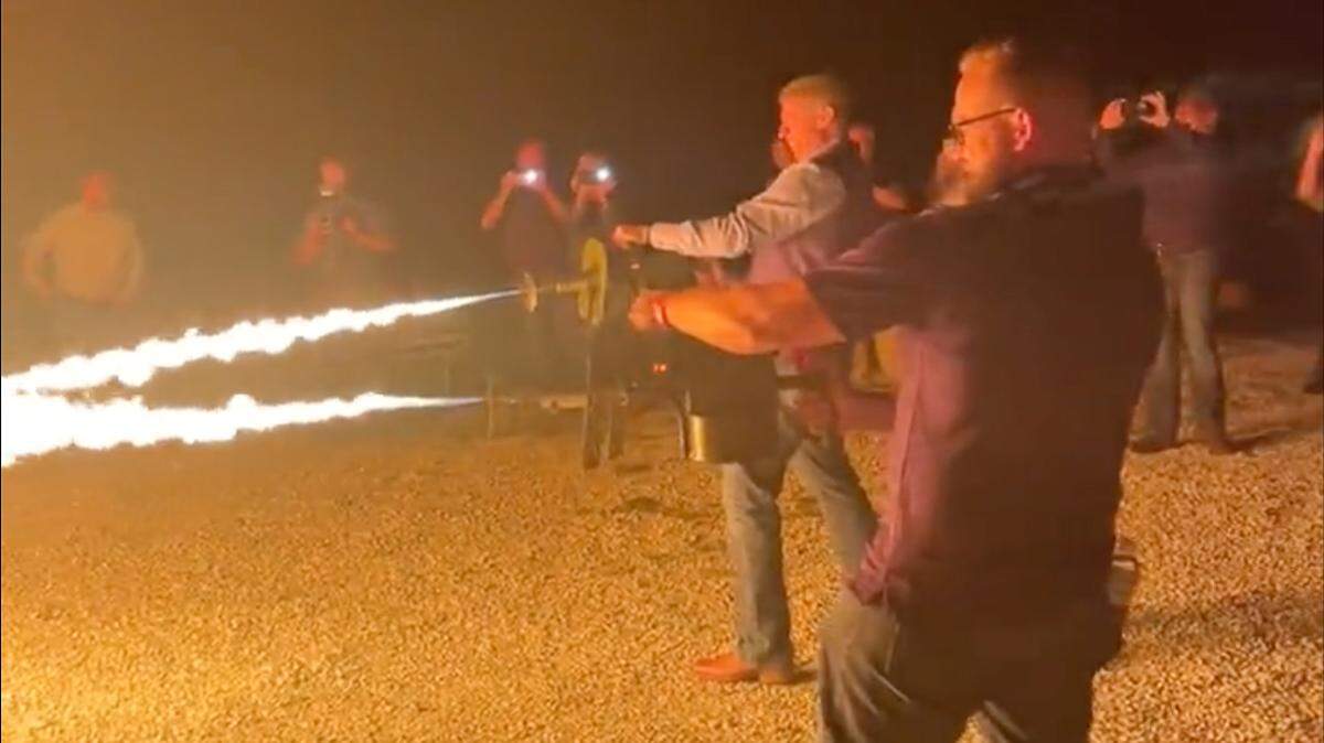 Republican Missouri gubernatorial candidate and state Sen. Bill Eigel and state Sen. Nick Schroer burn boxes with flamethrowers