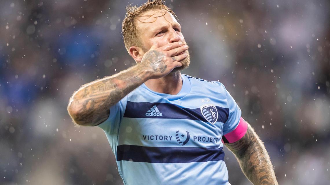 Sporting Kansas City forward Johnny Russell (7) blows a kiss to fans after scoring the second goal of the match during the match between Sporting Kansas City and the LA Galaxy on October 27, 2021 in Kansas City, Kansas.