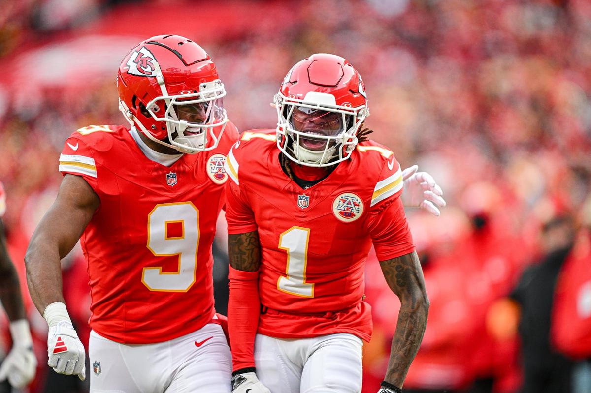 Kansas City Chiefs wide receiver Xavier Worthy (1) celebrates with wide receiver JuJu Smith-Schuster (9) after making a twisting catch in the first quarter against the Houston Texans during the AFC Divisional Round playoff game on Saturday, Jan. 18, 2025, at GEHA Field at Arrowhead Stadium.