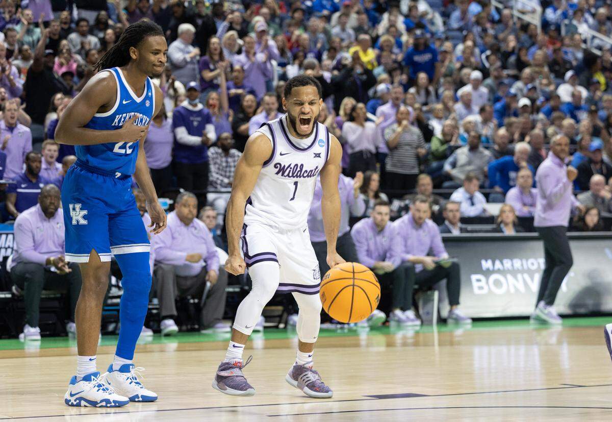 Kansas State’s Markquis Nowell lets out a yell after a Kentucky foul during the second half of their second round NCAA Tournament game in Greensboro, NC on Sunday.