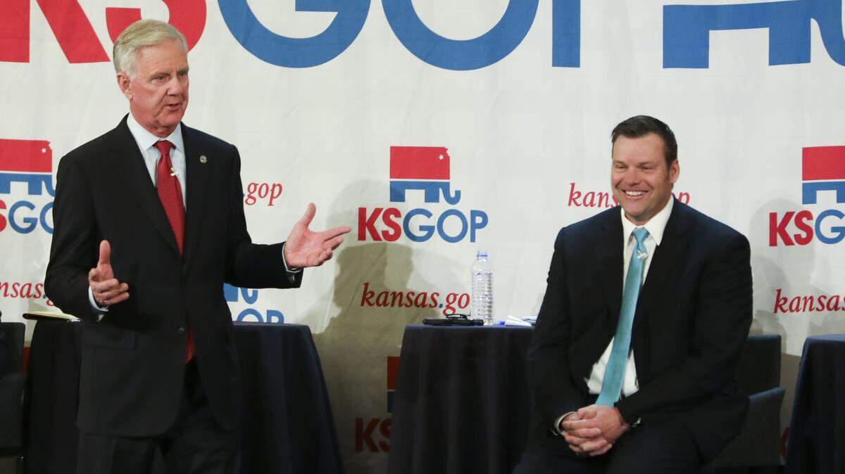 Wink Hartman, left, ran for lieutenant governor on the ticket with Republican gubernatorial nominee Kris Kobach.