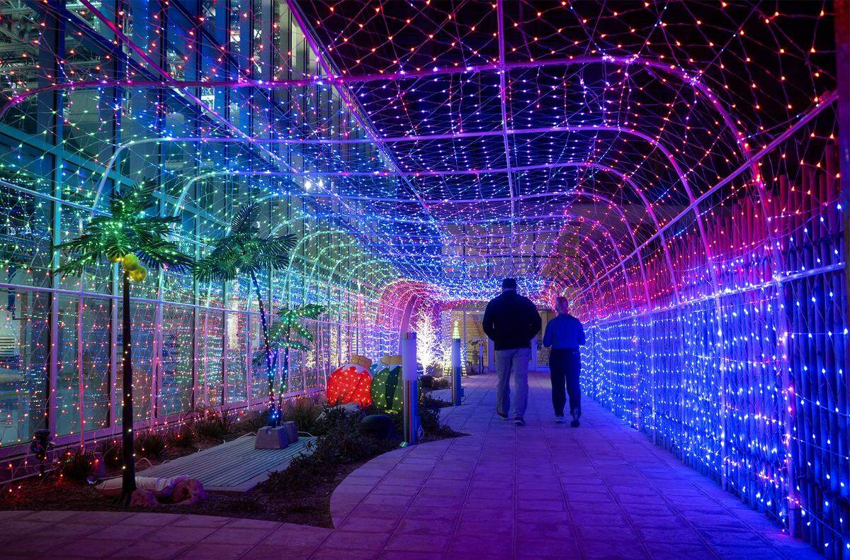 Walkway at the Margaritaville Hotel Kansas City, which has launched The Frosted Cabanas, a unique holiday pop-up event that opens on Wednesday, November 19, 2025. Guests can reserve private, heated cabanas on the pool deck, six cabanas decorated with festive holiday themes.