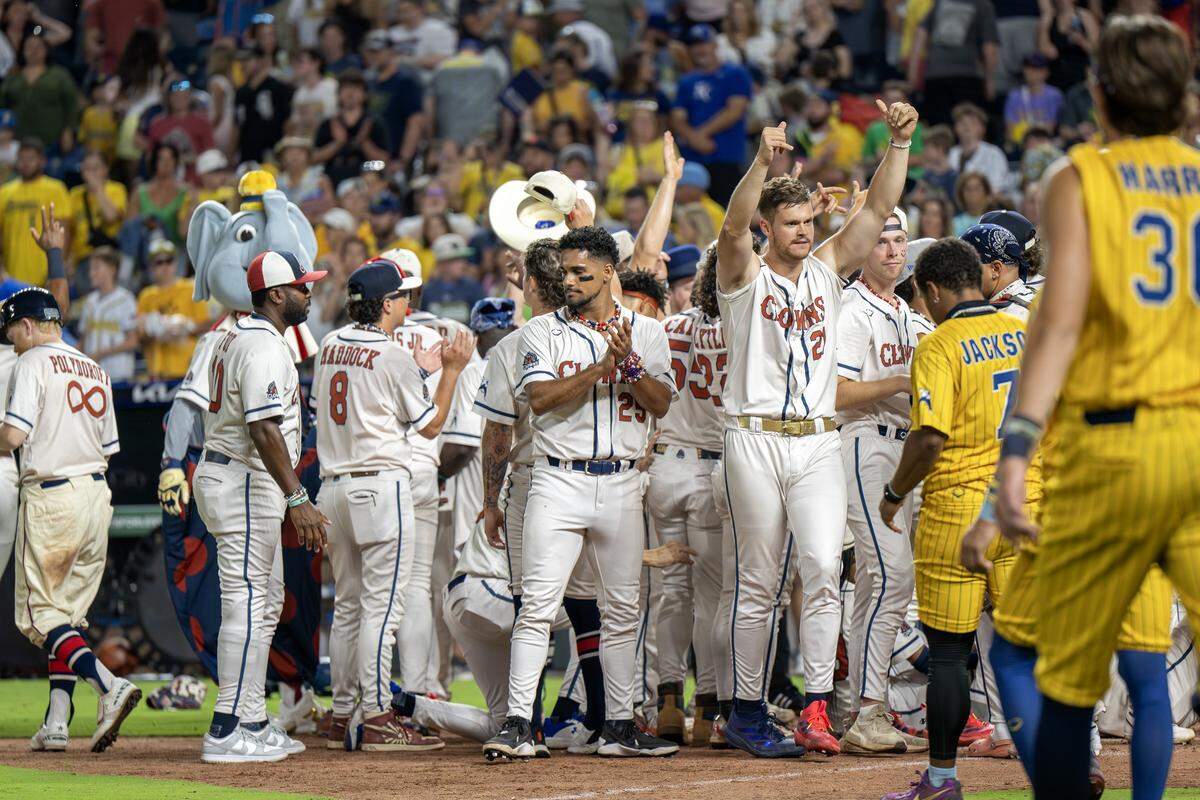 Indianapolis Clowns celebrate after a Banana Ball win over the Savannah Bananas at Kauffman Stadium Saturday, May 30, 2026, in Kansas City.