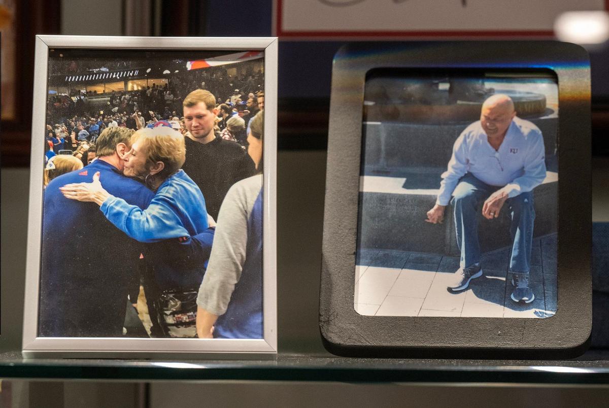 One of the photos displayed in Bill Self’s office shows his mother, Margaret, hugging him after the Kansas Jayhawks won the 2022 national title. Another shows his father, Bill Sr., who died shortly before that game.