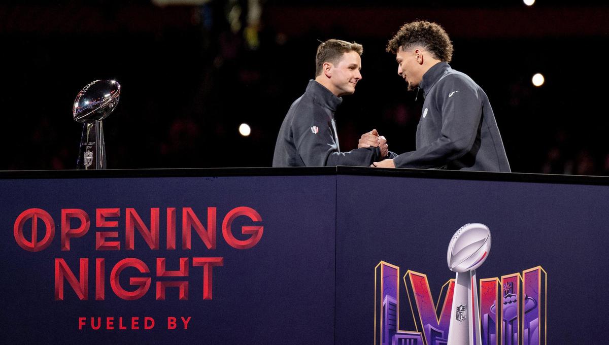 Kansas City Chiefs quarterback Patrick Mahomes, right, shakes hands with San Francisco 49ers quarterback Brock Purdy during Super Bowl LVIII’s Opening Night event at Allegiant Stadium on Monday, Feb. 5, 2024, in Las Vegas.