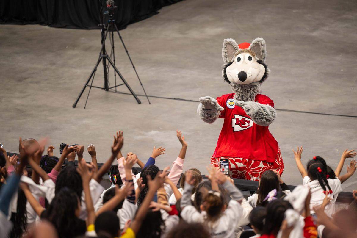 KC Wolf riles up kids from schools across the Kansas City metro area before Kansas City Chiefs quarterback Patrick Mahomes reads to them at the Lead to Read KC Reading Rally, on Thursday, April 2, 2026, at T-Mobile Center.